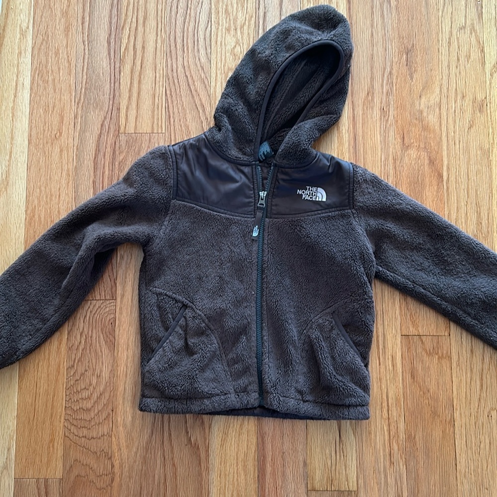 Brown north face hooded fleece lightweight jacket but very warm.